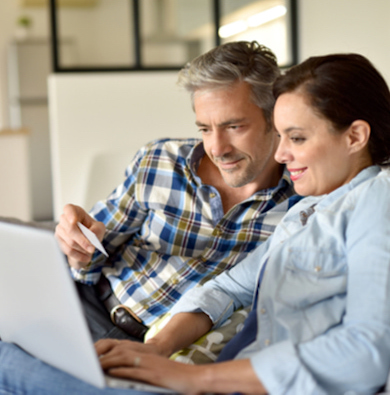 a couple looking at their finances