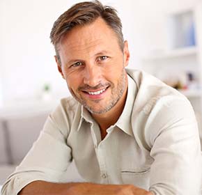 Middle age man smiling confidently